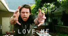 Jim Carrey reaching out with LOVE ME text