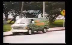 Ghostbusters Ecto-1 driving with crew inside