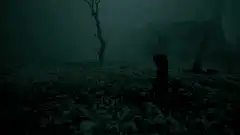 Zombie hand rises from ground