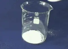 White powder overflowing beaker