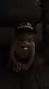 Baby with pacifier and hat