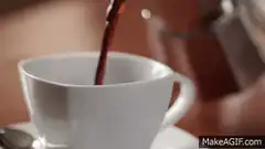 Pouring coffee into a white cup