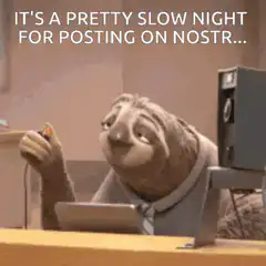 Sloth typing slowly on computer