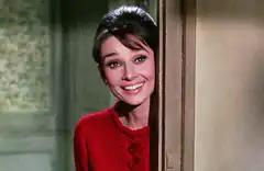 Audrey Hepburn smiling and laughing
