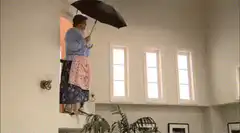 Woman falls from ceiling with umbrella