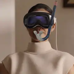 Woman with VR headset and snorkel