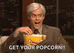 Bill Hader eating popcorn excitedly