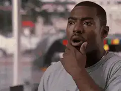 Chris Rock looking shocked and turning around