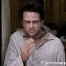 Man rubbing his neck in pain