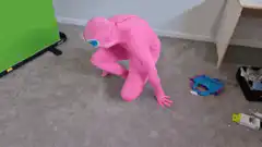 pink monster falls down stairs