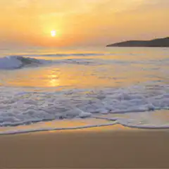 Sunset waves on beach