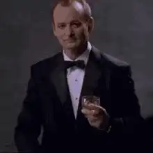 Norm Macdonald raises a glass