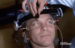 Man with electrodes on head