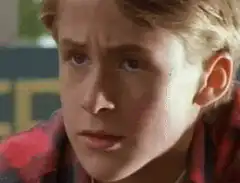 Macaulay Culkin smirking