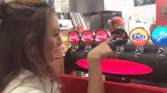 Woman pulls soda tap handle