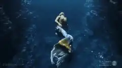 Mermaid swimming underwater