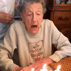 Elderly woman blows out 102 candles
