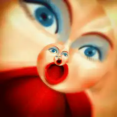 Doll face with nested screaming faces