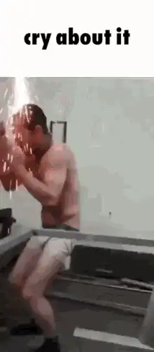Man in shower crying about it