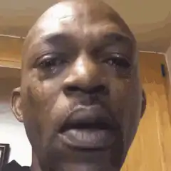 Man crying then smiling