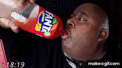 Man drinking Fanta