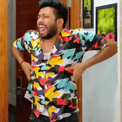Man in colorful shirt dancing