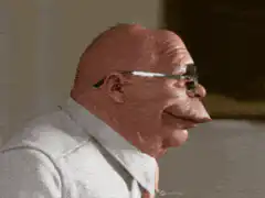 Bald man with glasses and big nose