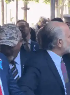 Donald Trump points and smirks