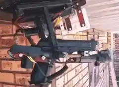 Robotic arm holding a gun