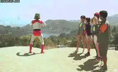 Power Rangers pose with teens