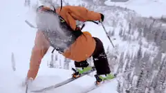 skier falling in deep snow