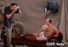 Newman posing for a photo in underwear