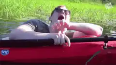 Man screaming in red kayak