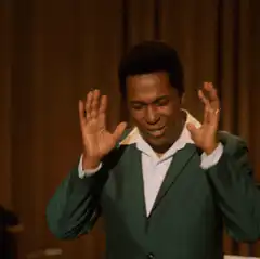 James Brown hands to chest