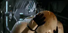 Finn removes his helmet in distress