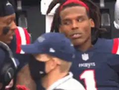 New England Patriots player falls asleep on bench