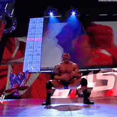 The Rock poses with pyrotechnics