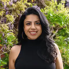 Smiling woman with long dark hair