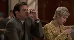 Man spits out drink in shock