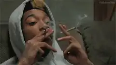 Wiz Khalifa smoking two cigarettes