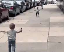 Toddler running with arms out