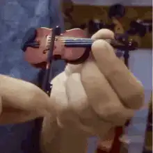 tiny violin being played