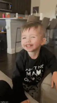 Toddler dancing and falling over