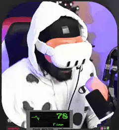 Man in VR headset reacts to health monitor