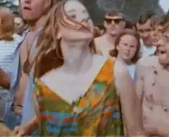 woman headbanging at concert