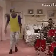 Dancing man and drummer in bedroom