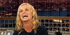 Amy Poehler laughing hysterically