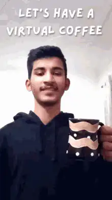 Man holding coffee mug with text