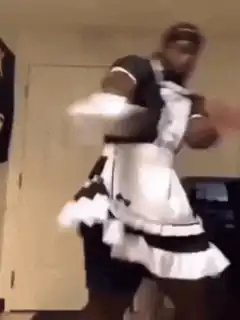 Man in maid outfit dancing