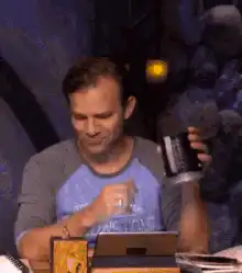 Man facepalms and covers face in frustration
